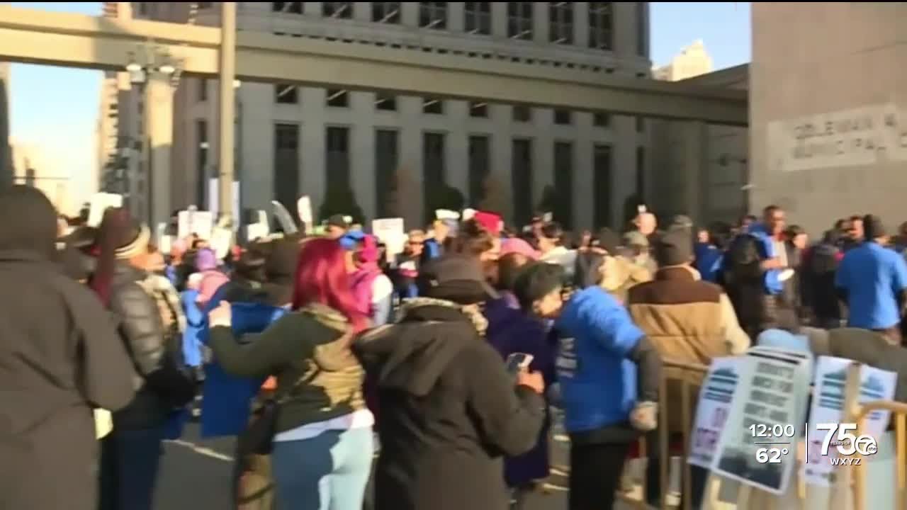 Striking Detroit casino workers march to city hall